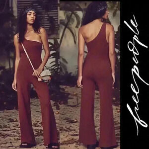 BNWT Free people Women’s Waverly Jumpsuit size S fit  til large